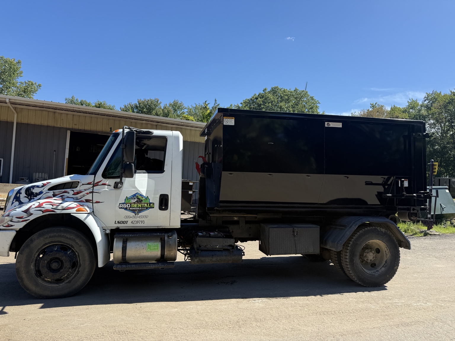 R&D Rentals & Removals roll-off dumpster truck